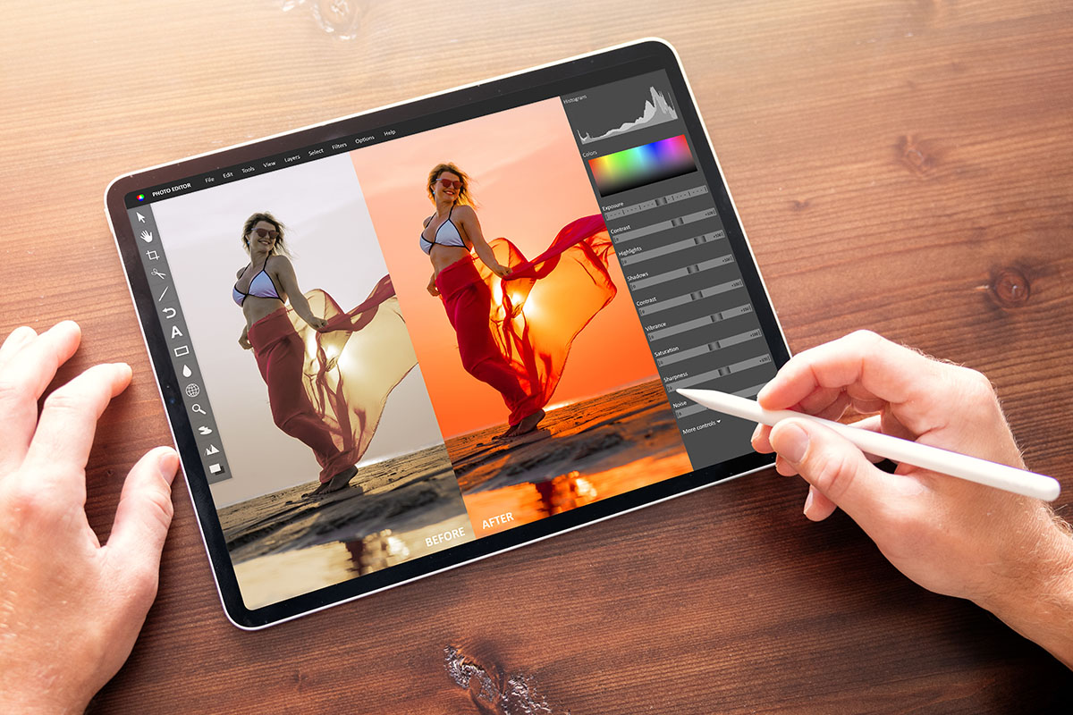 woman editing on an ipad
